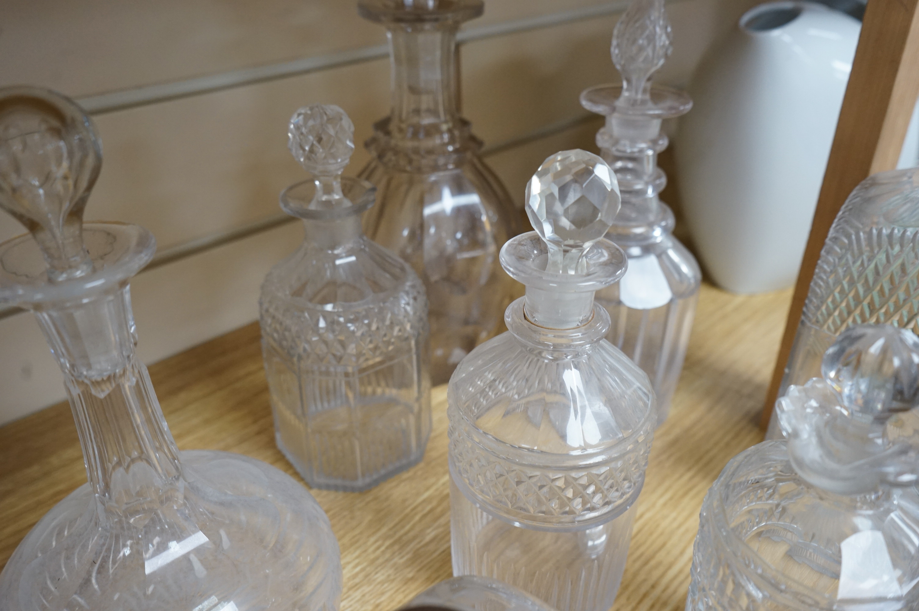 A collection of assorted drinking glassware including sets of decanters and a large etched glass goblet, largest 27cm high